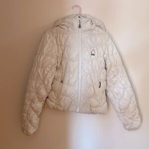 Classic Sierra Designs white puffer jacket.